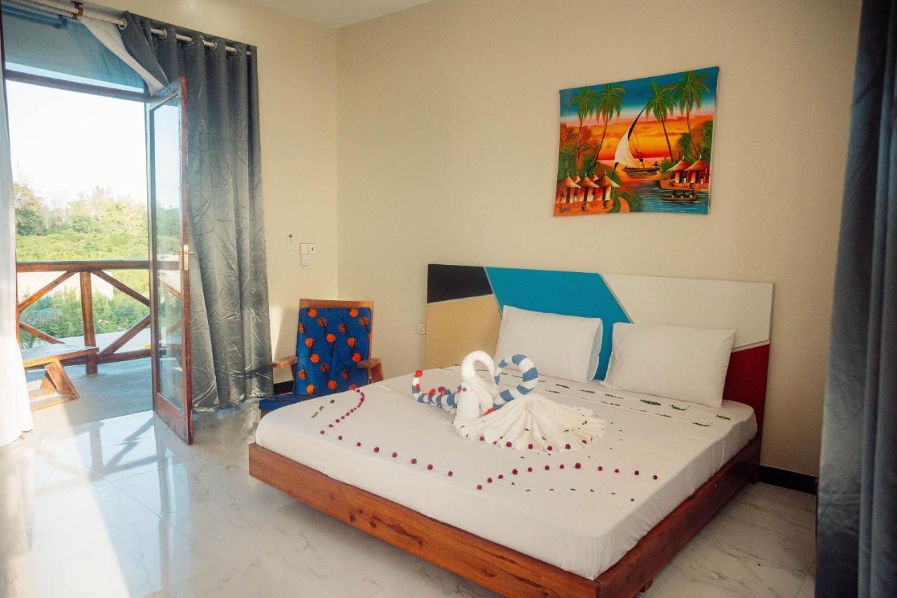Ocean Breeze Hotel Нунгви Екстериор снимка